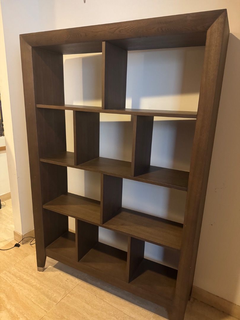 Solid Timber Bookcase (Category: Shelves, Cabinets & Racks) located in Singapore. Submitted by williaje (Listing ID 1447983187, Image 3). Description: Solid timber display shelf in warm walnut finish. Sturdy, high quality construction. Will require 2 people to move. Some minor marks and wear (see photo). 1.8m x 1.2m x 36cm.