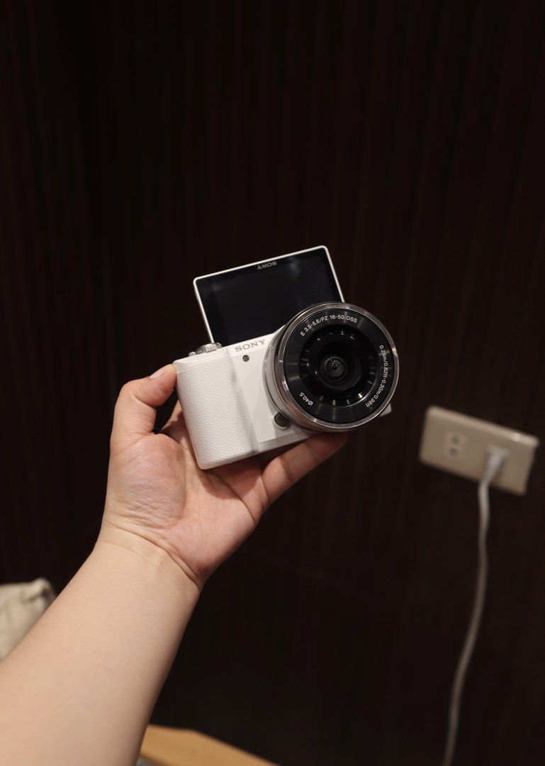Sony a5100 with 15-45 lens White edition (Category: Cameras) located in Manila. Submitted by jaimeeloutan (Listing ID 1448044331, Image 2). Description: for sale Sony a5100 Mirrorless with 16-50 lens 21,490 only Almost new pocket size camera 💰21,490 only fix price posted lowest price in market best seller for photoshoot and video good condition No issue White edition color - Sony a5100 Mirrorless with 16-50 sony lens built with flash 24.3MP APS-