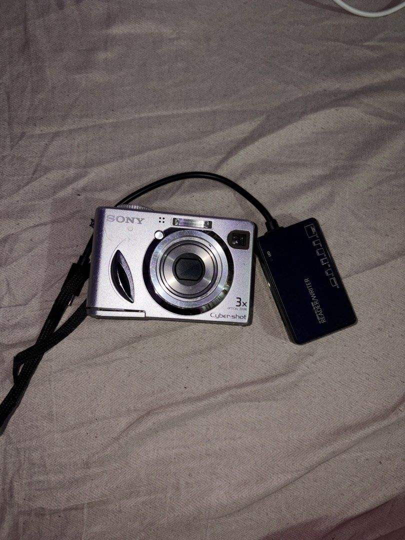 Sony Cybershot Digital Camera (Category: Cameras) located in Manila. Submitted by k.luvrxs (Listing ID 1448072873, Image 1). Description: -free shipping via Jnt -freebies: ORGINAL SONY MEMORY STICK, ORIGINAL SONY 16 GB CARD, and type c Card reader Use rechargeable battery for this camera! minor scratches all buttons work and all functions! .