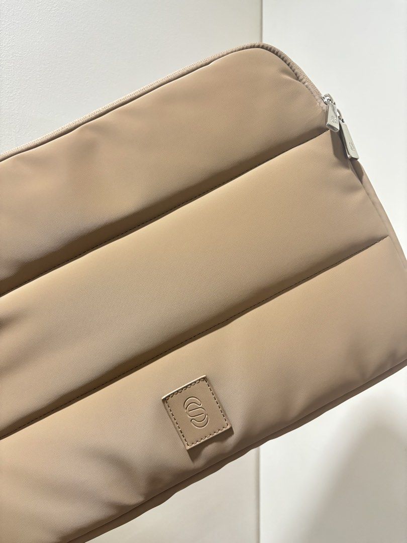 Straightforward Laptop Sleeve - Affogato (Category: Laptop Bags & Sleeves) located in Makati City. Submitted by shop.jsf (Listing ID 1447960626, Image 3). Description: - Brand new: Affogato color - Beige padded laptop sleeve - Fits laptops up to 15 inches - Secure zip closure - With pockets inside.