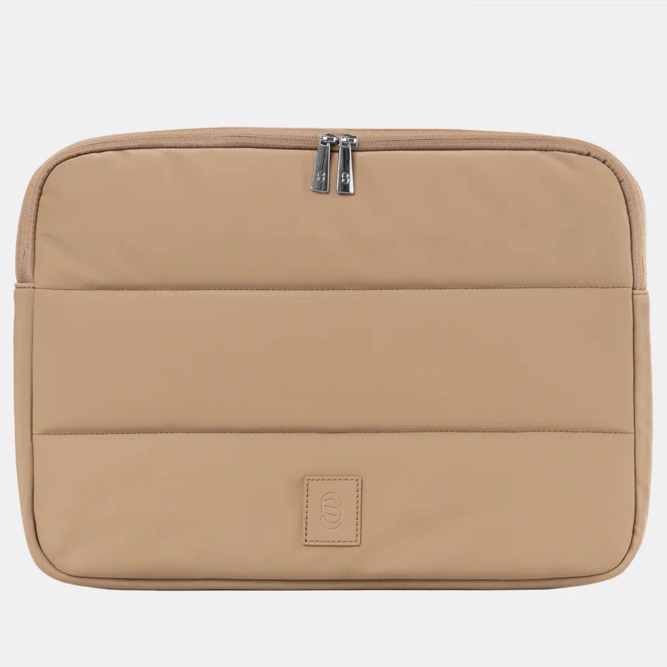 Straightforward Laptop Sleeve - Affogato (Category: Laptop Bags & Sleeves) located in Makati City. Submitted by shop.jsf (Listing ID 1447960626, Image 1). Description: - Brand new: Affogato color - Beige padded laptop sleeve - Fits laptops up to 15 inches - Secure zip closure - With pockets inside.