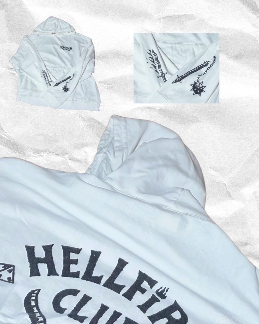 Stranger Things Hellfire Club Hoodie (Category: Hoodies) located in Mandaluyong City. Submitted by juliaaaaaannnn (Listing ID 1447989282, Image 1). Description: Stranger Things Hoodie (XL) 27x25 Features sword and mace graphics on the sleeves .