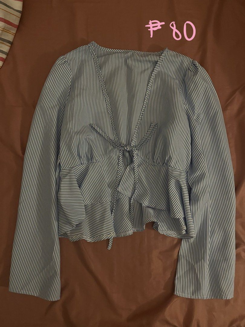 Striped Tie-Front Peplum Blouse with Bell Sleeves (Category: Blouses) located in Las Pinas. Submitted by sujninee (Listing ID 1448045732, Image 1). Description: - Cute striped design - Tie-front detail - Flattering peplum hem - Flowy bell sleeves - Deep V-neckline - Versatile for casual or dressed-up looks - Easy to style with jeans or skirts.