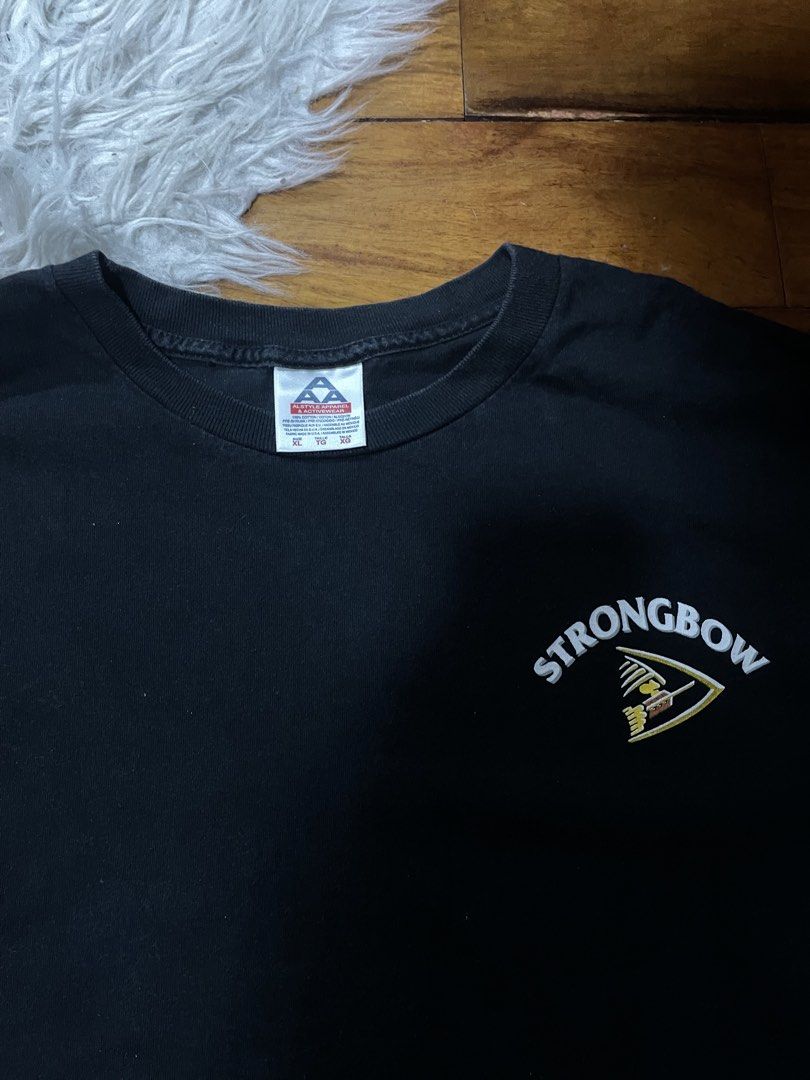 Strongbow Beer T-shirt (Category: Tshirts & Polo Shirts ) located in Cainta. Submitted by FirstBuys (Listing ID 1447994661, Image 2). Description: - Tripple ABlack t-shirt AAA - Features Strongbow logo on front and back - Short sleeves - Comfortable fit - Perfect for casual outings.