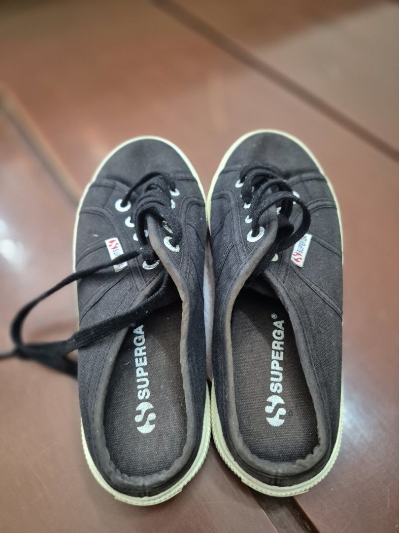 Superga Black Canvas Low Top Sneakers (Category: Sneakers) located in San Jose. Submitted by nova2023 (Listing ID 1447892511, Image 3). Description: - Classic black Superga sneakers - Made of durable canvas material - Features white rubber soles - Secure lace-up closure - Comfortable for all-day wear - Versatile for various casual outfits.