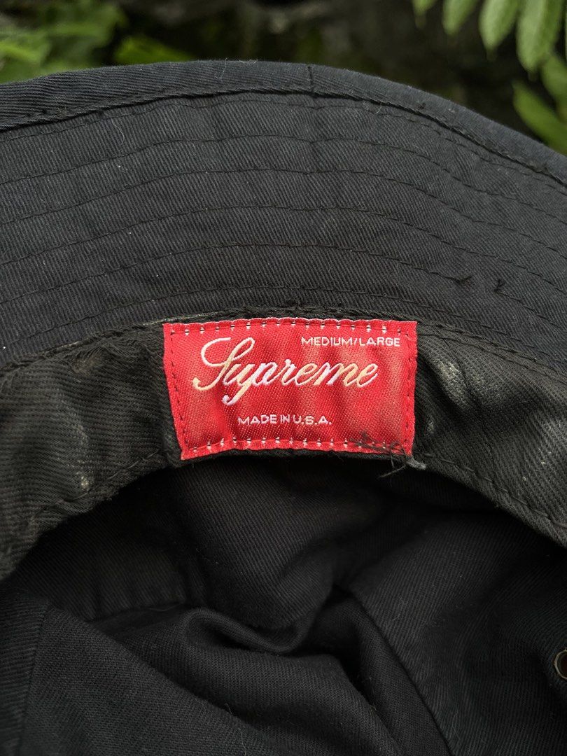 Supreme Bucket Hat Black Medium/Large Made in USA (Category: Caps & Hats) located in Davao. Submitted by streetsight (Listing ID 1448003369, Image 3). Description: - Classic black Supreme bucket hat - Features iconic Supreme logo band - Made in the USA - Size: Medium/Large - Ideal for sunny days or adding streetwear flair - A must-have for Supreme fans.