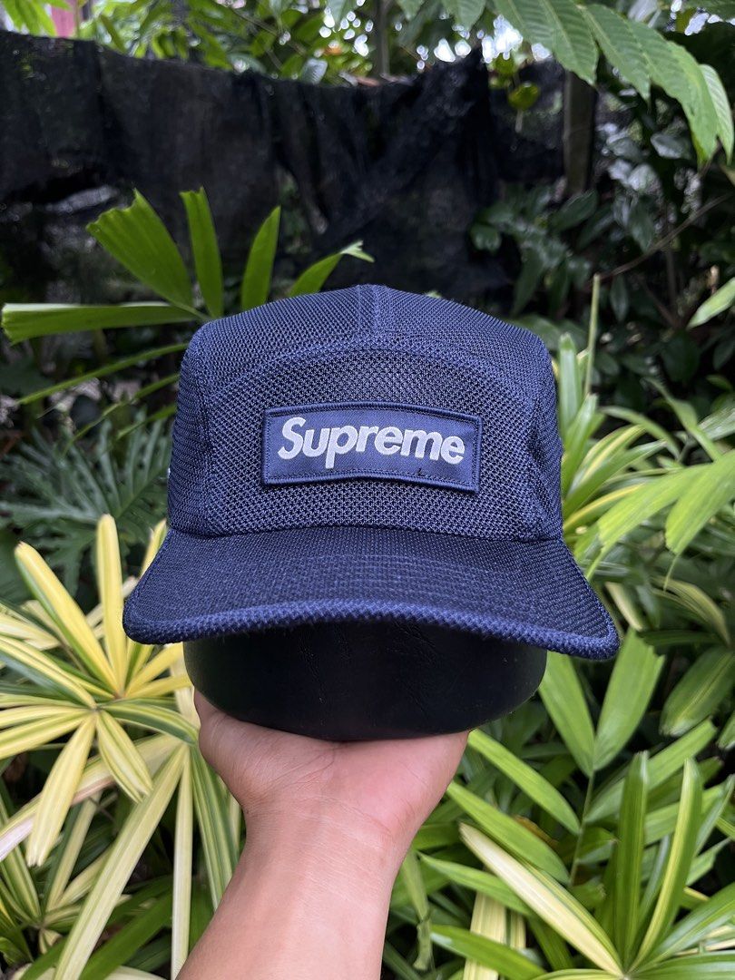 Supreme Cordura Mesh Camp Cap Navy (Category: Caps & Hats) located in Davao. Submitted by streetsight (Listing ID 1448003474, Image 1). Description: - Navy blue Supreme camp cap - Made with durable Cordura mesh material - Classic Supreme box logo on the front - Adjustable strap for a comfortable fit - Ideal for everyday wear.