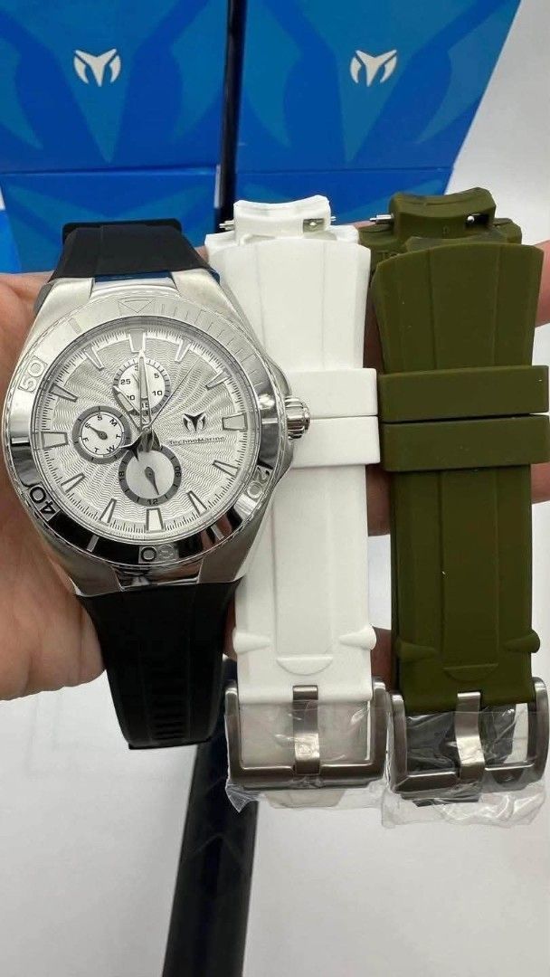 TechnoMarine Chronograph Watch with Extra Straps (Category: Men's Watches) located in Caloocan City. Submitted by plinkydespabiladeras (Listing ID 1447977475, Image 1). Description: - TechnoMarine chronograph watch - Original box included - Silver dial - Black rubber strap - Two extra straps: 1 white, 1 olive green - All original pieces are present.