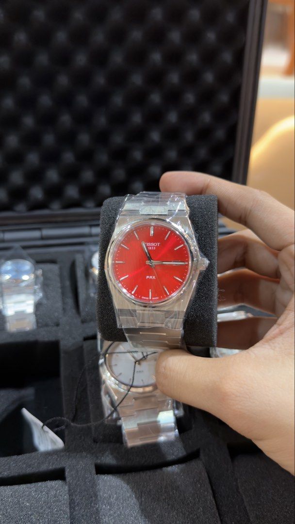Tissot PRX Quartz - Red Dial (40mm) (Category: Luxury Watches) located in Angeles City. Submitted by horologe (Listing ID 1448052576, Image 1). Description: Tissot Prx Quartz - Red Dial (40mm) Complete Box, Papers, and Warranty Original and Brandnew ₱18,500 ONLY Negotiable for Sure Buyers Only PM.