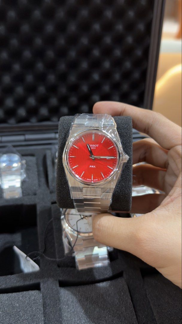 Tissot PRX Quartz - Red Dial (40mm) (Category: Luxury Watches) located in Angeles City. Submitted by horologe (Listing ID 1448052576, Image 2). Description: Tissot Prx Quartz - Red Dial (40mm) Complete Box, Papers, and Warranty Original and Brandnew ₱18,500 ONLY Negotiable for Sure Buyers Only PM.