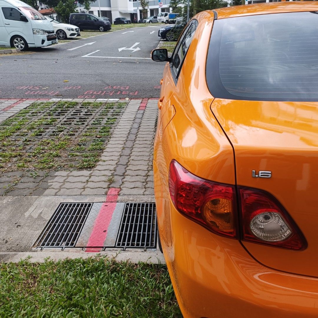 Toyota Corolla Altis 1.6 Standard (A) (Category: Used Cars) located in Singapore. Submitted by jojodas03 (Listing ID 1447938662, Image 2). Description: Selling my orange Toyota Altis sedan. It's the 1.6 model. The interior has beige leather seats and floor mats. The trunk is spacious and clean. Exterior is a bright orange. comes with Android player and new brambo brake pads.Ready for a new owner..