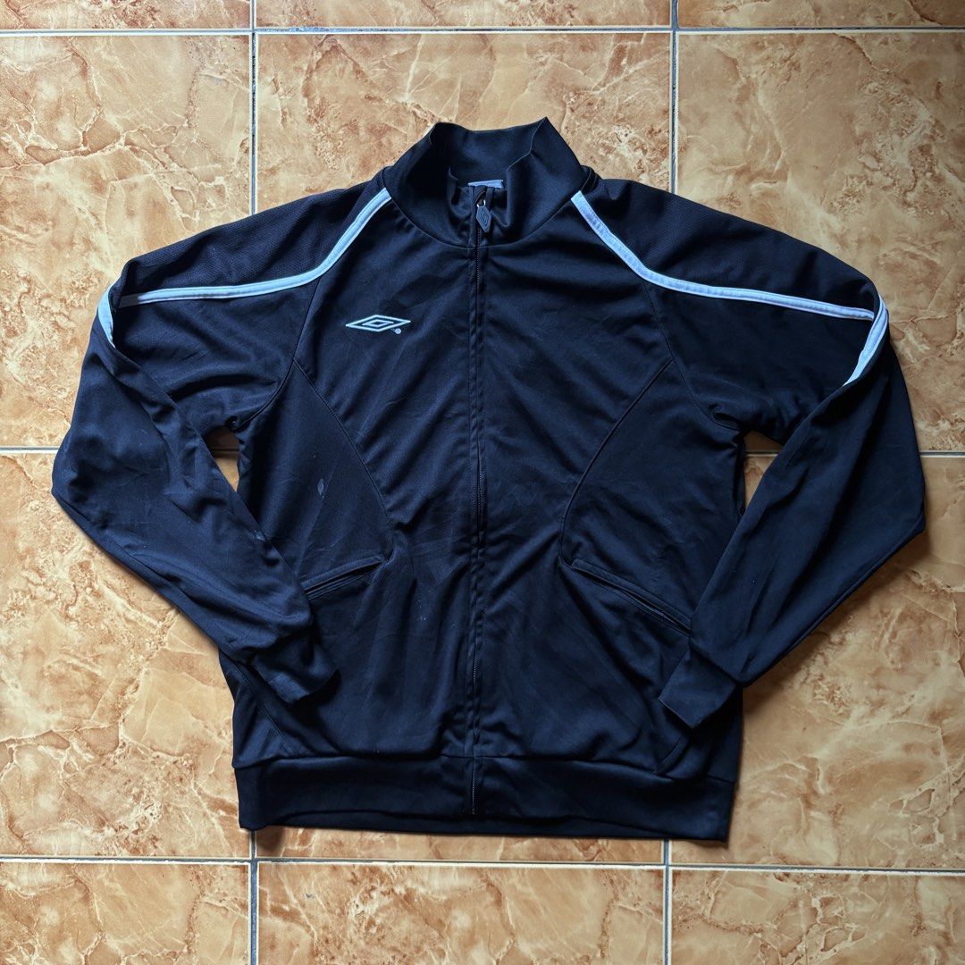 UMBRO TRACK JACKET (Category: Activewear) located in Manila. Submitted by mikodvn (Listing ID 1447981812, Image 1). Description: UMBRO TRACK JACKET SIZE MEDIUM WxL 21x25 9/10 CONDITION ISSUE: STAIN .