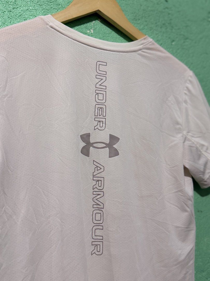 UnderArmour Dri Fit Running Tee (Category: Activewear) located in Baguio. Submitted by ragstorichesph (Listing ID 1448030221, Image 2). Description: under armour dri fit running tee excellent condition 9.5/10 color condition W20 L26 (stretchable) has minor washable stains baguio loc.