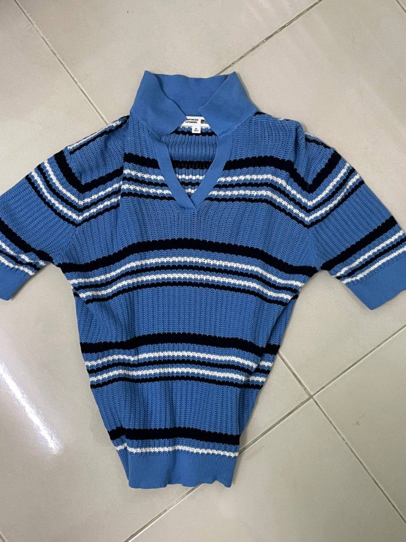Uniqlo Striped Knit Polo Top (Category: Longsleeves) located in Kuala Terengganu. Submitted by adamhadafi14172 (Listing ID 1447887930, Image 1). Description: - Blue knit top - White and black stripes - Short sleeves - Collar detail - V-neck opening - Ideal for casual wear.