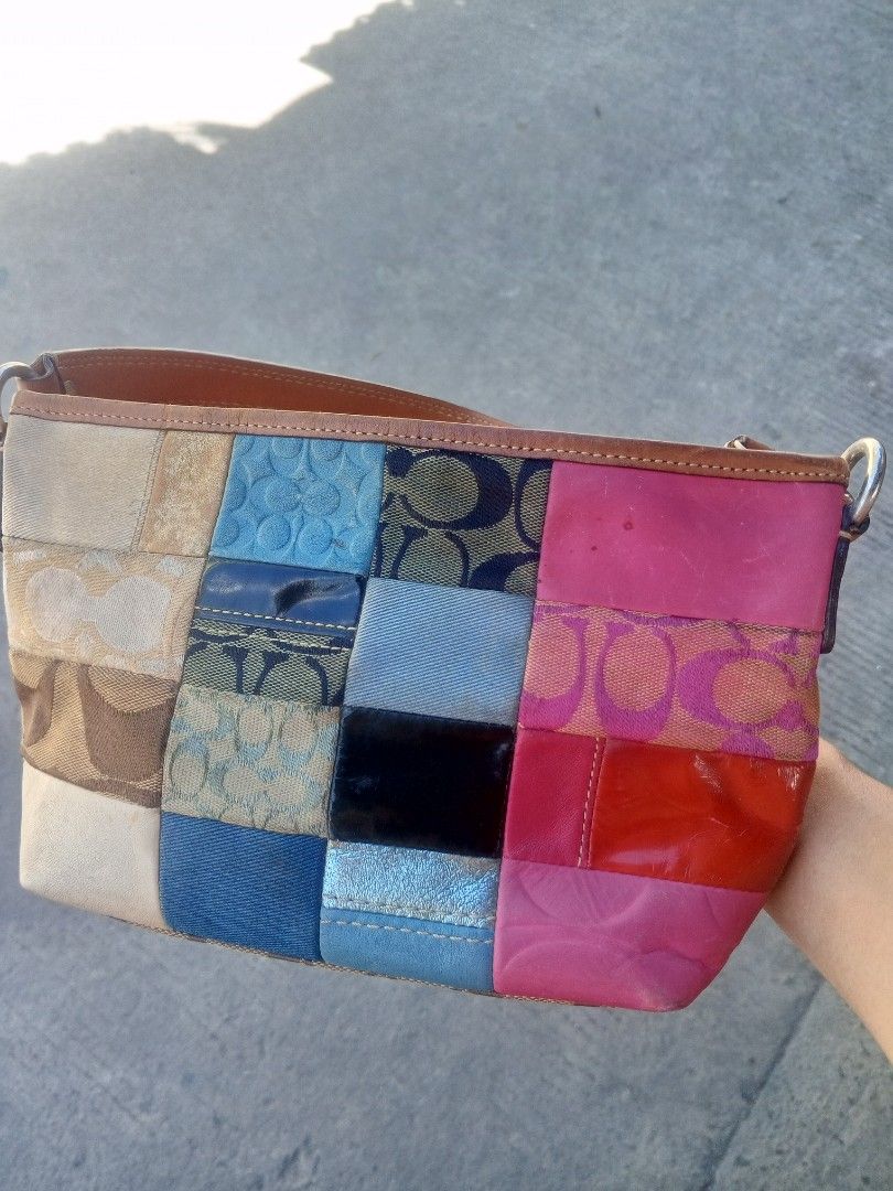 Vintage Coach Patchwork Multi-Color Shoulder Bag (Category: Luxury Bags & Wallets) located in Manila. Submitted by skelebento60011 (Listing ID 1447989773, Image 1). Description: - Adorable Coach shoulder bag - Unique patchwork design with Coach monogram, colorful leather, and fabric squares - Tan leather strap and trim - Secure zipper closure - Bright blue fabric interior - Perfect for adding a pop of color - Approximate dimensions: 10 inches (le