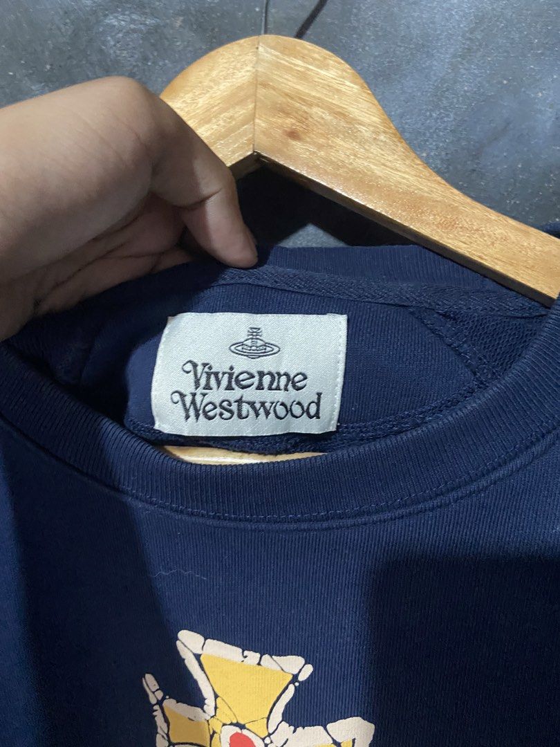Vivienne Westwood Raglan Time Machine SweatShirt (Category: Luxury Apparel) located in Naga. Submitted by gentlyusedthreads (Listing ID 1448030967, Image 3). Description: Good as New Condition Size S on tag can fit to medium 10/10 color rate 10/10 condition only need wash no issue.