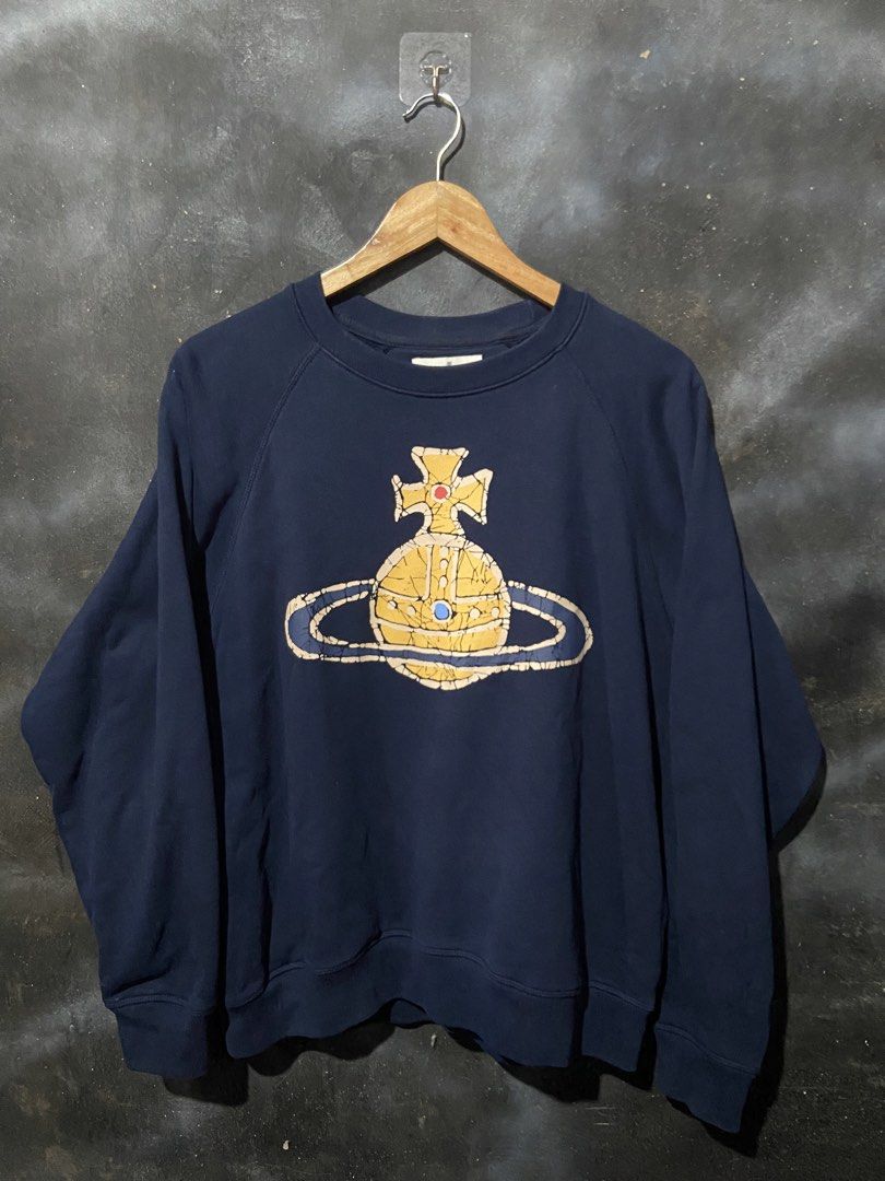 Vivienne Westwood Raglan Time Machine SweatShirt (Category: Luxury Apparel) located in Naga. Submitted by gentlyusedthreads (Listing ID 1448030967, Image 2). Description: Good as New Condition Size S on tag can fit to medium 10/10 color rate 10/10 condition only need wash no issue.