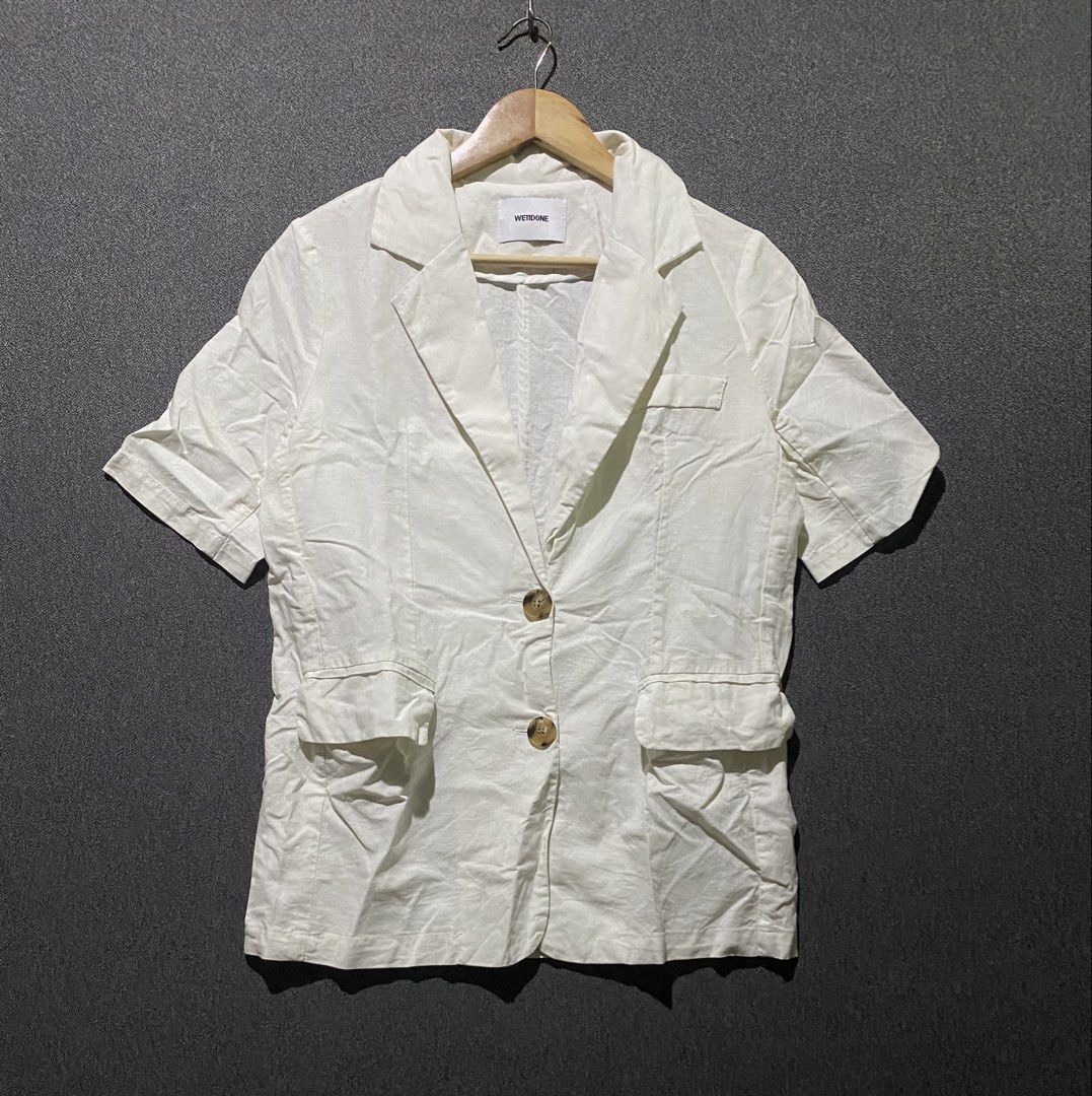 WETIDONE White Short Sleeve Blazer Size S (Category: Coats, Jackets and Outerwear) located in Manila. Submitted by hell_market (Listing ID 1448036555, Image 1). Description: - Brand: WETIDONE - Color: White - Sleeve Length: Short Sleeve - Closure: Two-button - Pockets: Two front pockets - Material: 100% Cotton - Origin: Made in Korea - Size: S - Style: Great for layering or wearing on its own.