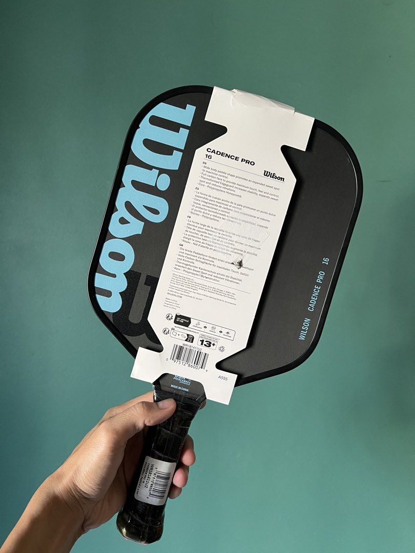 Wilson Cadence Pro 16 Pickleball Paddle (Category: Racket and Ball Sports) located in Marikina City. Submitted by laguertapat (Listing ID 1447917189, Image 2). Description: (Price is for solo paddle only) ‼️ Price still negotiable! especially if you buy the pair. - Brand new Wilson Cadence Pro 16 pickleball paddles - Raw carbon surface for maximum spin - Excellent for control and spin - Still in original packaging RFS: Impulsive buy 😆.