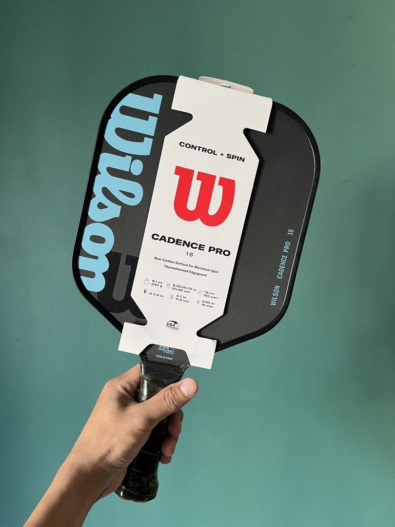 Wilson Cadence Pro 16 Pickleball Paddle (Category: Racket and Ball Sports) located in Marikina City. Submitted by laguertapat (Listing ID 1447917189, Image 1). Description: (Price is for solo paddle only) ‼️ Price still negotiable! especially if you buy the pair. - Brand new Wilson Cadence Pro 16 pickleball paddles - Raw carbon surface for maximum spin - Excellent for control and spin - Still in original packaging RFS: Impulsive buy 😆.
