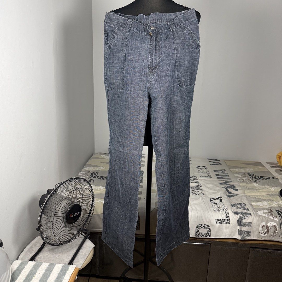 Women's Grey Denim Bootcut Jeans (Category: Jeans) located in Cavite. Submitted by gail_03 (Listing ID 1448016313, Image 2). Description: - Grey denim jeans - Bootcut style - Front pockets and belt loops - Button and zipper closure - Comfortable for everyday wear - A versatile addition to your wardrobe.