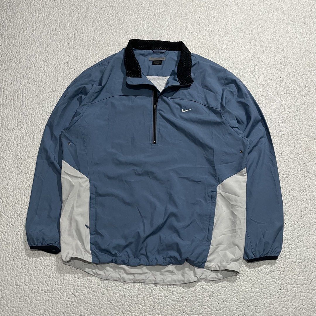 Y2K Vintage Nike Half Zip Windbreaker (Category: Coats, Jackets and Outerwear) located in Cavite. Submitted by holeeb (Listing ID 1447997012, Image 1). Description: Vintage Y2K N/ike Reflective Half Zip Windbreaker XXL on tag Dimes: 25x30(front)x32(back) Color rate: 9.8/10 Condition: 9.6/10 excellent condition🔥 + sf (shipping fee depends on size of pouch and location) Issue: small hole on sleeve and minimal cracks on reflective strips (swipe for