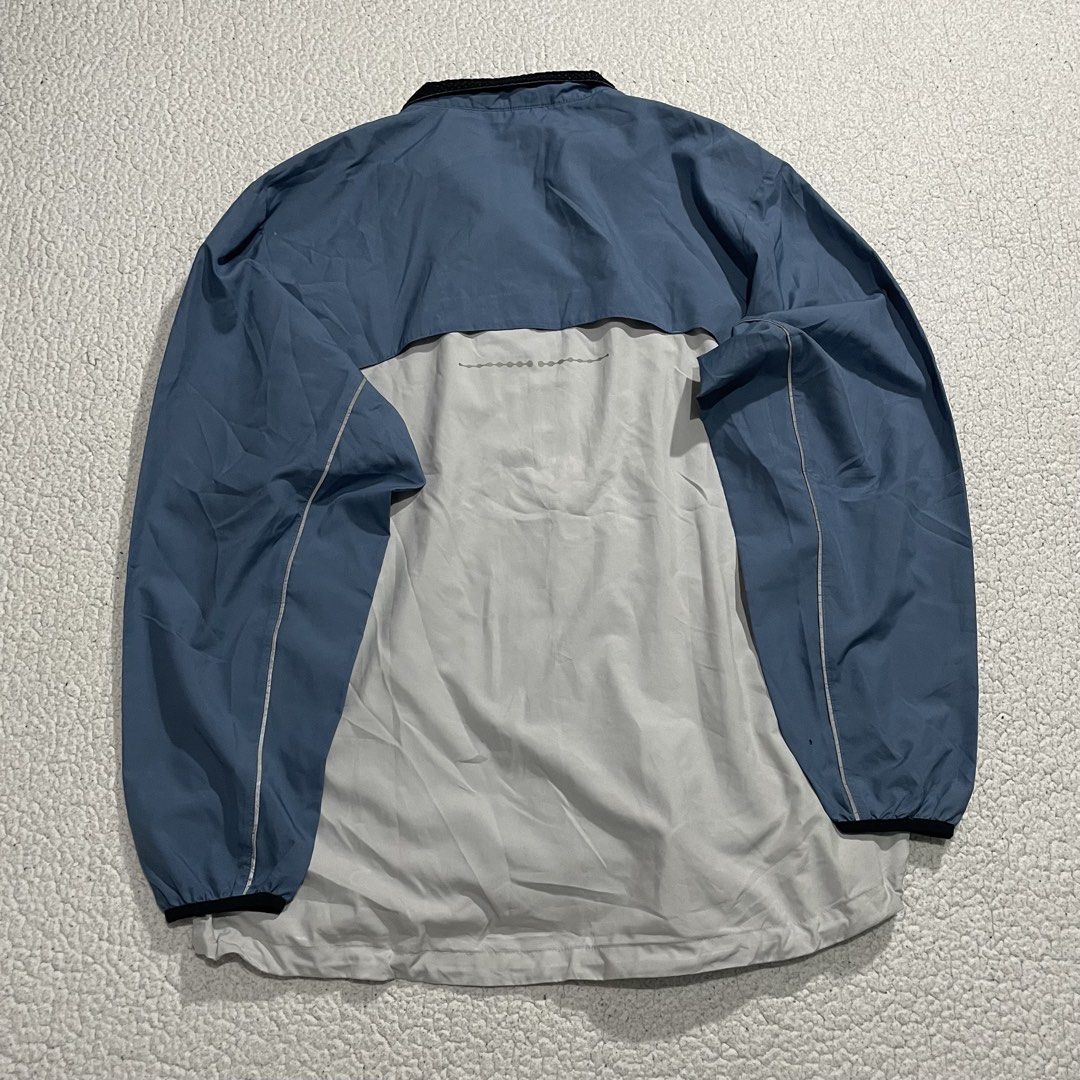 Y2K Vintage Nike Half Zip Windbreaker (Category: Coats, Jackets and Outerwear) located in Cavite. Submitted by holeeb (Listing ID 1447997012, Image 2). Description: Vintage Y2K N/ike Reflective Half Zip Windbreaker XXL on tag Dimes: 25x30(front)x32(back) Color rate: 9.8/10 Condition: 9.6/10 excellent condition🔥 + sf (shipping fee depends on size of pouch and location) Issue: small hole on sleeve and minimal cracks on reflective strips (swipe for