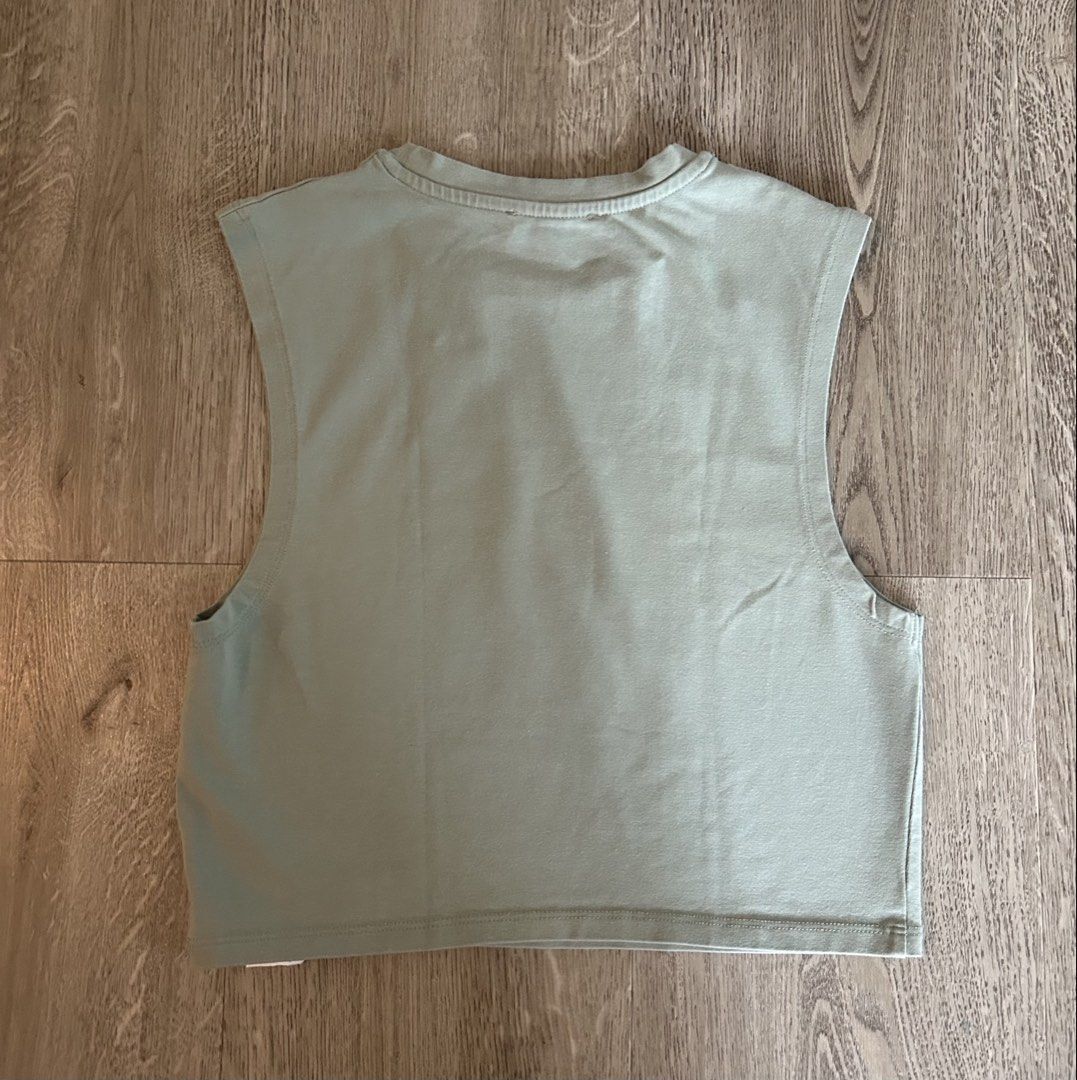 Zara Sleeveless Cropped Top - Light Green (Category: Sleeveless) located in Makati City. Submitted by ellabernaro_ (Listing ID 1447974419, Image 2). Description: - Zara cropped sleeveless top - Light green color - Body Hugging fit - Crew neckline - Ideal for casual outfits or layering.