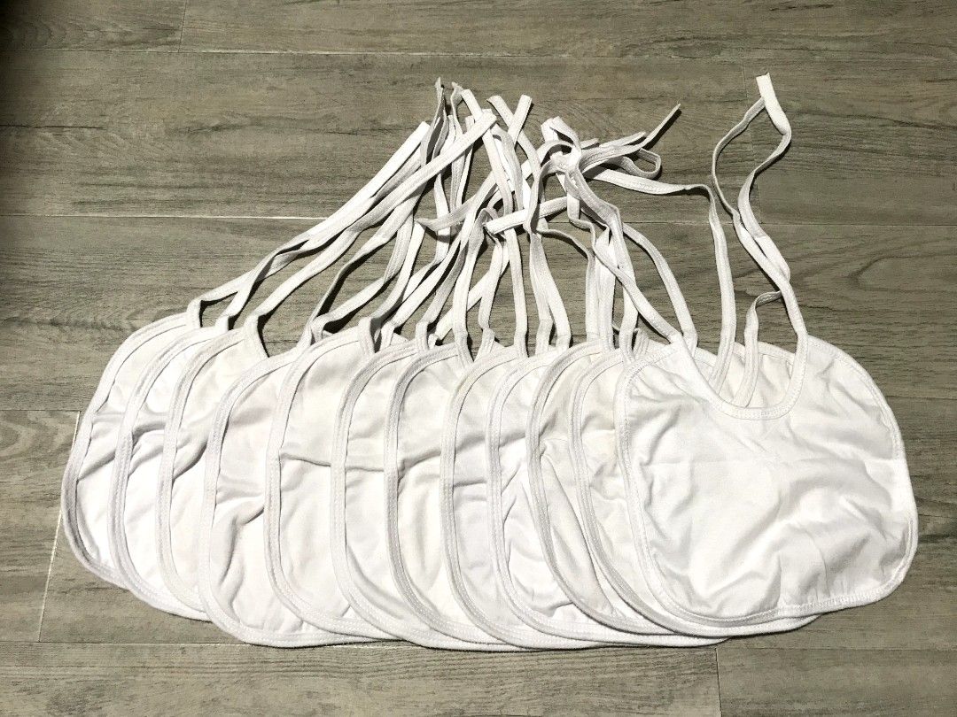 12pcs Cotton Bib + 1pc Button Cotton Bib (Category: Weaning & Toddler Feeding) located in Cavite. Submitted by mommyd.clutter (Listing ID 1448092537, Image 1). Description: ➡️some bibs have minimal yellowish stain due to stirage ‼️Please manage your expectations as these items are preloved/used..