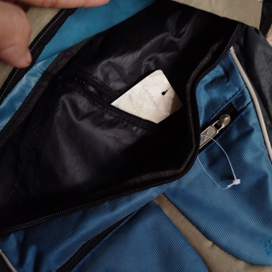 2000s Adidas Crossbody Shinny (authentic) (Category: Sling Bags) located in Cabiao. Submitted by aeclark (Listing ID 1448209525, Image 3). Description: Excellent Condition with certificate and price With pocket inside and in the straps see last photo for issue need deep wash .