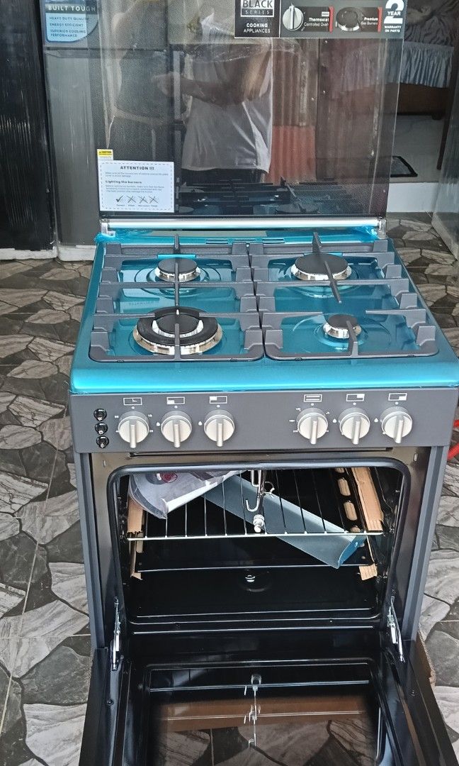 60cm Gas Range Fujidenzo (Category: Cookers) located in Caloocan City. Submitted by yam_appliances (Listing ID 1448275751, Image 2). Description: 60 cm Cooking Range 4 Gas Burner Matte black body – Stain and scratch resistant (Elegant and modern look) Wok Burner Cast Iron Pan Support Thermostat controlled Oven Rotisserie Full electric ignition Stainless steel cook top Mirror glass oven door Minute Minder Adjustable levelling feet Oven Safety Valv