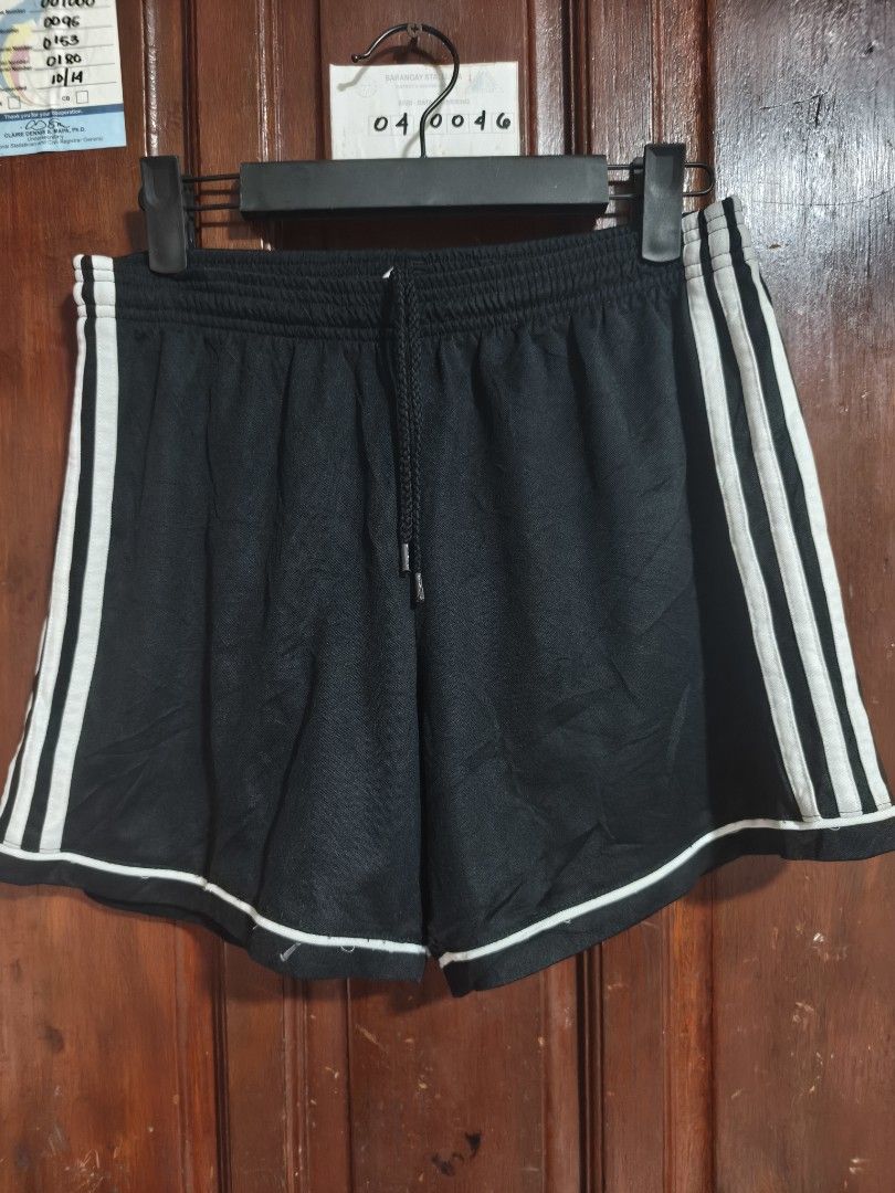 Adidas Black Shorts with White Stripes (Category: Shorts) located in Quezon City. Submitted by makmakramirez (Listing ID 1448110025, Image 2). Description: size 27-38 length 13inches - Adidas black shorts - White stripes on sides - Elastic waistband with drawstring - Size M (Japan) - Ideal for sports or casual wear - Comfortable material loc Santa Lucia novaliches.