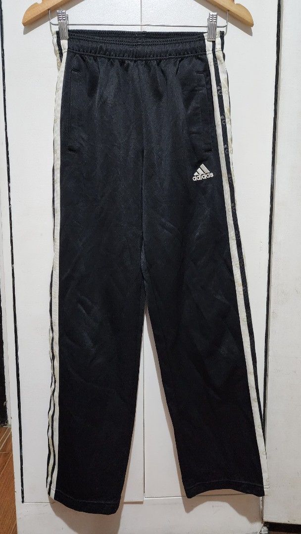 Adidas Black Track Pants with White Stripes (Category: Other Bottoms) located in Meycauayan. Submitted by MP_Shop (Listing ID 1448101054, Image 1). Description: Size: 24W x 36L inches Good Condition Color rate: 9/10 issue: may maliit na butas. last pic upload Loc: Meycauayan Bulacan Courier: J&T Mop: Gcash .