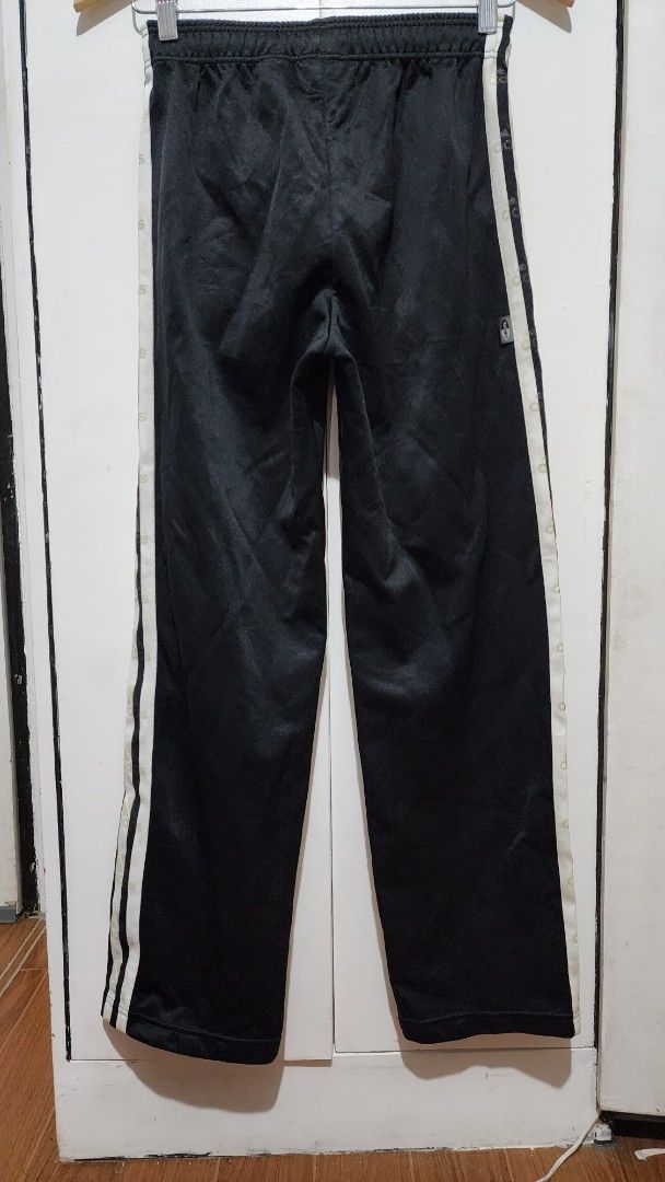 Adidas Black Track Pants with White Stripes (Category: Other Bottoms) located in Meycauayan. Submitted by MP_Shop (Listing ID 1448101054, Image 2). Description: Size: 24W x 36L inches Good Condition Color rate: 9/10 issue: may maliit na butas. last pic upload Loc: Meycauayan Bulacan Courier: J&T Mop: Gcash .