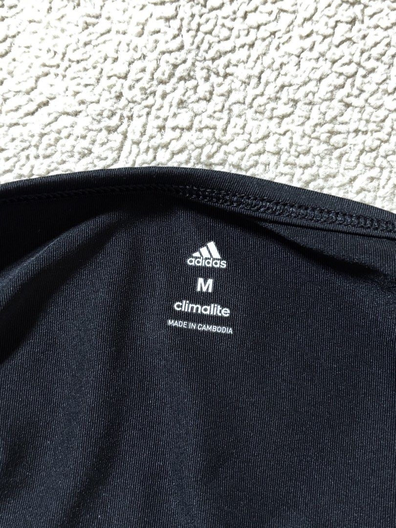 Adidas Climalite Black T-shirt Size M (Category: Tshirts & Polo Shirts ) located in Makati City. Submitted by skelssei (Listing ID 1448166200, Image 2). Description: - Adidas Climalite T-shirt - Size: Medium (M) - Material: Climalite (breathable, moisture-wicking) - Ideal for: Workouts, sports, or casual wear - Condition: Great, ready for its next owner.
