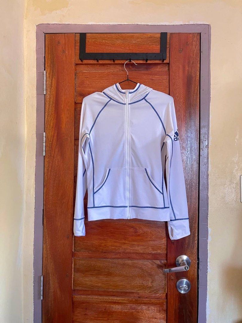 Adidas Drifit Hoodie Jacket (Category: Activewear) located in Baler. Submitted by revibeee (Listing ID 1448225898, Image 3). Description: FOR SALE ADIDAS FULL ZIP DRIFIT HOODIE JACKET COLOR WHITE WITH BLUE LINING LIKE NEW CONDITION COLOR RATE 9.5/10 WIDTH 17 TO 19 INCHES | LENGTH 23 INCHES AUTHENTIC | ORIGINAL BEST FIT SIZE EXTRA SMALL TO MEDIUM BODY FRAME KINDLY CHECK THE PHOTOS FOR THE COMPLETE DETAILS WASHED AND READY TO WEAR LIGHTLY USED POLY