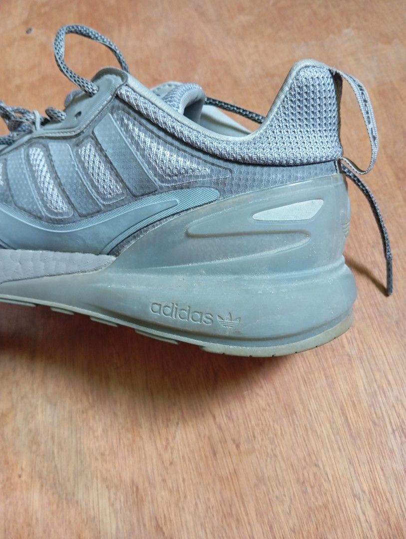 Adidas ZX 2K BOOST Sneakers Grey (Category: Sneakers) located in Iloilo. Submitted by badbox26 (Listing ID 1448155889, Image 3). Description: - Adidas ZX 2K BOOST sneakers in grey - Features comfortable Boost sole for all-day comfort - Mesh and synthetic upper for breathability and support - Secure lace-up closure - Perfect for everyday wear or light training sessions.