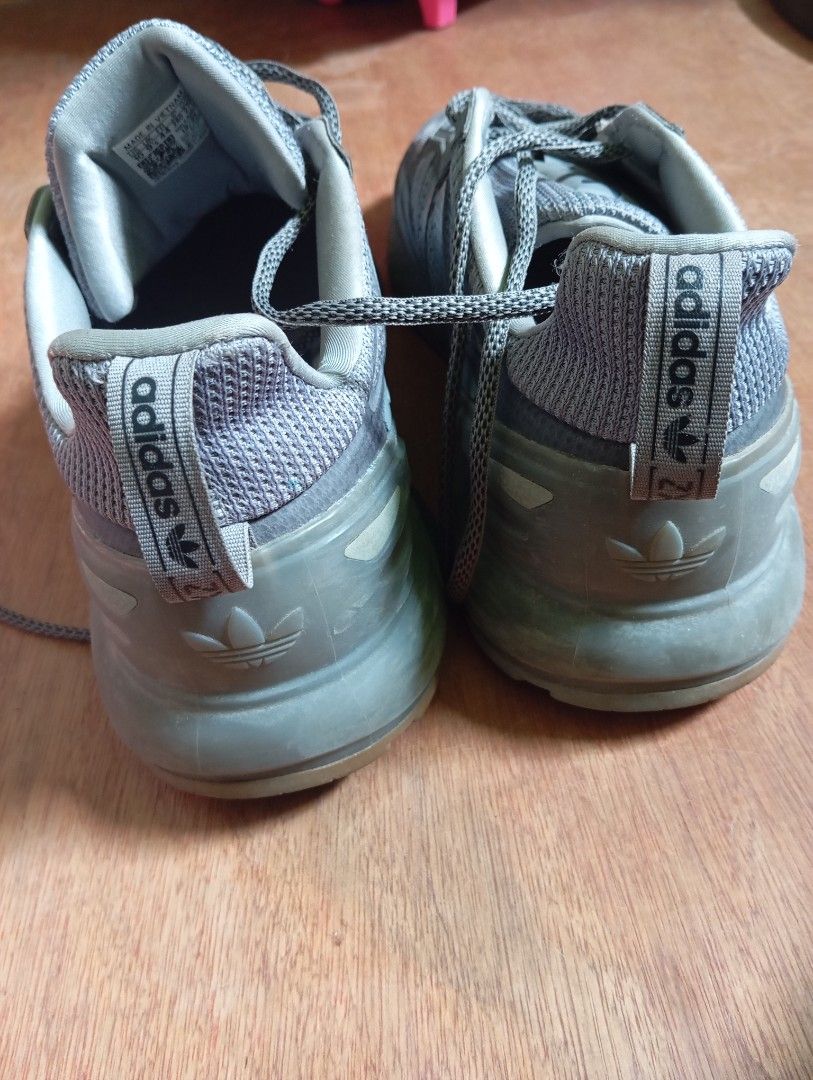 Adidas ZX 2K BOOST Sneakers Grey (Category: Sneakers) located in Iloilo. Submitted by badbox26 (Listing ID 1448155889, Image 2). Description: - Adidas ZX 2K BOOST sneakers in grey - Features comfortable Boost sole for all-day comfort - Mesh and synthetic upper for breathability and support - Secure lace-up closure - Perfect for everyday wear or light training sessions.