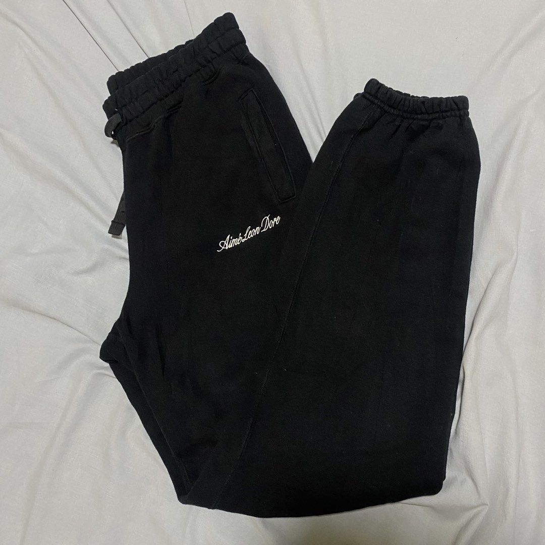 Aime Leon Dore Black Script Sweatpants (Category: Joggers) located in Manila. Submitted by sometimesalways (Listing ID 1448273058, Image 2). Description: Aime Leon Dore Black Script Sweatpants Size: S W: 14 - 14.5 L: 40 Fits 28-30 waistline Issue/s: Minimal color fade Price: 750.