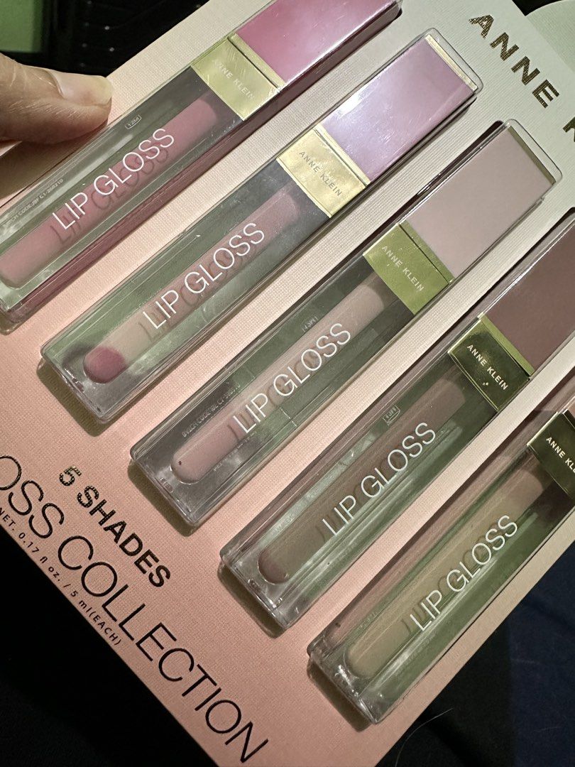Anne Klein 5 Shades Lip Gloss Collection (Category: Makeup) located in Quezon City. Submitted by _meffenamic (Listing ID 1448084197, Image 3). Description: - Set of 5 Anne Klein lip glosses - Includes a variety of nude and pink shades - Perfect for everyday wear or special occasions - Each tube is 5ml - Comes in a gift set packaging.