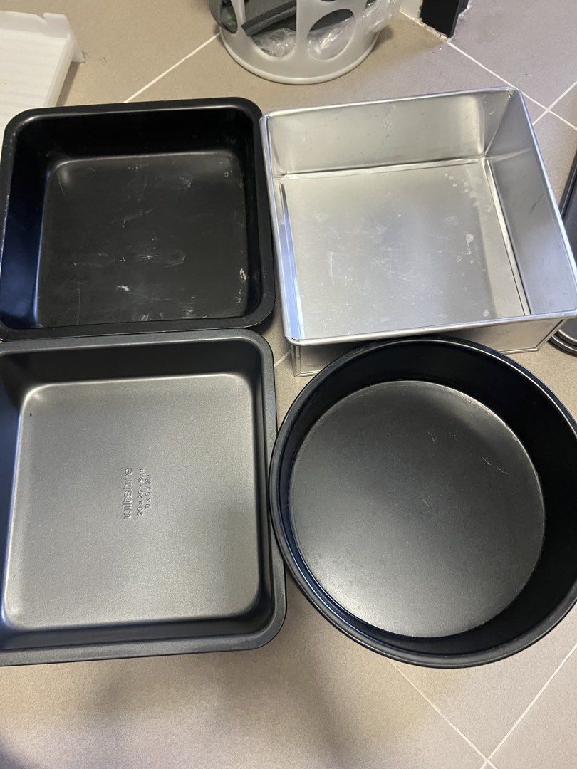 Assorted Baking Pans, Muffin Tins, and Molds