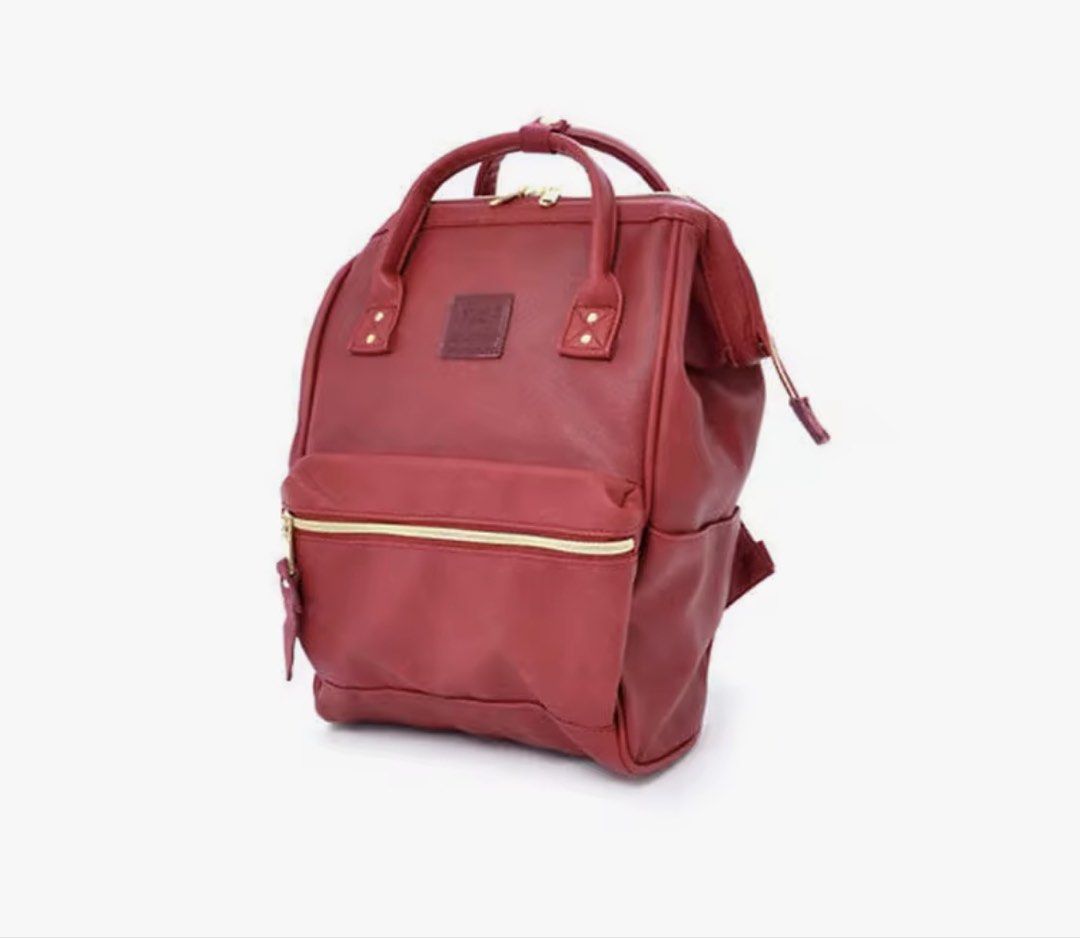 Authentic Anello Burgundy Red Faux Leather Backpack (Category: Backpacks) located in Manila. Submitted by lovenice (Listing ID 1448229272, Image 2). Description: - Price is fixed already ‼️ - Bought this from sm megamall for 3k - Noticeable flaw on right (as seen in picture) - Overall, still in good functionality and condition - Mini Size (seen when wearing).