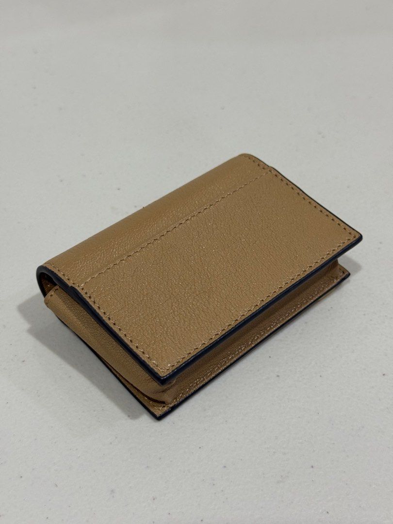 Authentic Christian Dior Card Holder (Beige Leather CD Logo) (Category: Luxury Bags & Wallets) located in Imus. Submitted by guecomargeaux (Listing ID 1448141491, Image 2). Description: Authentic Christian Dior Card Holder, Beige Leather CD Logo - Money back guaranteed if proven fake - No issue PM if interested..