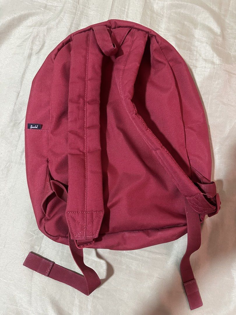 Authentic Herschel Backpack - Red with Pink Front Pocket (Category: Backpacks) located in Taguig. Submitted by sassythrifter (Listing ID 1448148180, Image 3). Description: - Authentic Herschel backpack - Color: Deep Red with a contrasting Pink front pocket - Features the iconic Herschel striped interior lining - Classic and durable design - Front pocket with zipper for easy access - Suitable for everyday use and travel - Condition: Excellent, wel