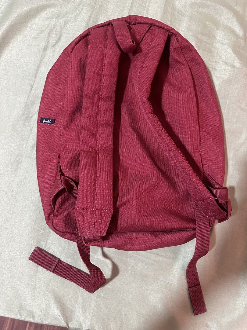 Authentic Herschel Backpack - Red with Pink Front Pocket (Category: Backpacks) located in Taguig. Submitted by sassythrifter (Listing ID 1448148180, Image 2). Description: - Authentic Herschel backpack - Color: Deep Red with a contrasting Pink front pocket - Features the iconic Herschel striped interior lining - Classic and durable design - Front pocket with zipper for easy access - Suitable for everyday use and travel - Condition: Excellent, wel