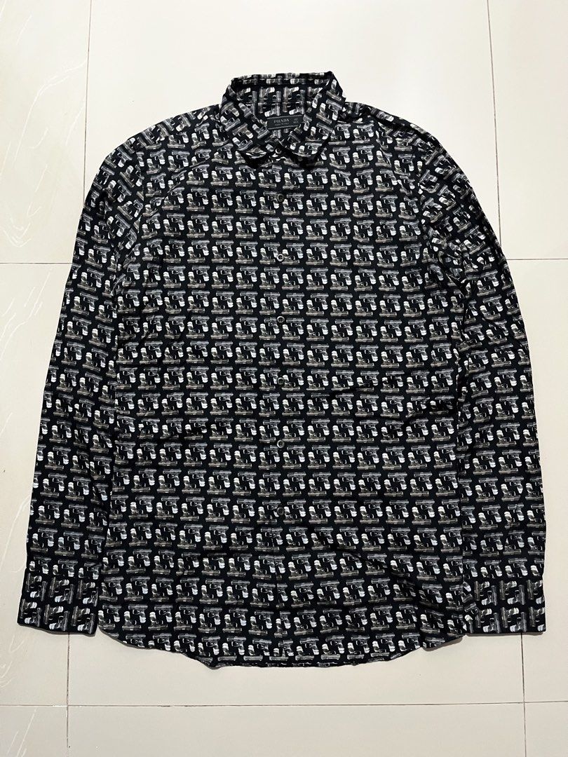 AW2012 PRADA ICONIC GUN PRINT SHIRT (Category: Luxury Apparel) located in Cagayan de Oro. Submitted by middlesosa (Listing ID 1448170851, Image 1). Description: AW2012 PRADA ICONIC GUN PRINT SHIRT SIZE LARGE FITTINGS WIDTH - 21 inches LENGTH - 30 inches SLEEVE - 27 inches SHOULDER - 18 inches MADE IN ITALY AUTHENTIC CUT WASHTAG EXCELLENT CONDITION 10k pesos.