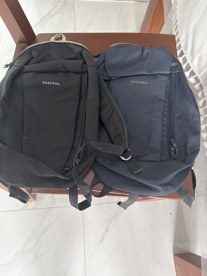 Backpack (Category: Backpacks) located in Singapore. Submitted by v9vdg8k79t (Listing ID 1448165137, Image 1). Description: - Two Quechua backpacks included - Colors: Black and Navy Blue - Suitable for daily use and short trips - Lightweight and practical design - brand new price is for each item.