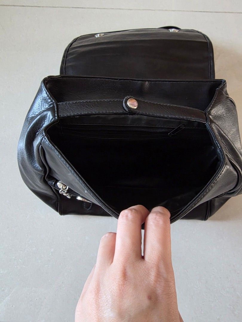 Backpack (Category: Backpacks) located in Singapore. Submitted by flyingdonkey (Listing ID 1448169006, Image 3). Description: Condition: Preloved 8/10 If I am not wrong, should be leather material. Bought in Germany Size: 25x26x18l0cm.