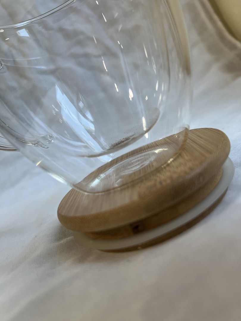 Besuto Double Wall mug 250ml (Category: Coffee & Tea Tableware) located in Manila. Submitted by angieeeler (Listing ID 1448137526, Image 3). Description: Original Besuto Double Walled mug 250ml - Double wall clear glass mug - Natural bamboo lid included - Keeps hot drinks hot & cold drinks cold - Comfortable handle for easy holding - Stylish, modern aesthetic.