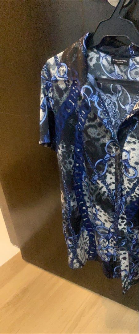 Blouse printed back 2 back (Category: Blouses) located in Quezon City. Submitted by bebothann (Listing ID 1448196189, Image 2). Description: Blouse printed back to back Perception women 2XL SF c/o buyer Buttons in front.